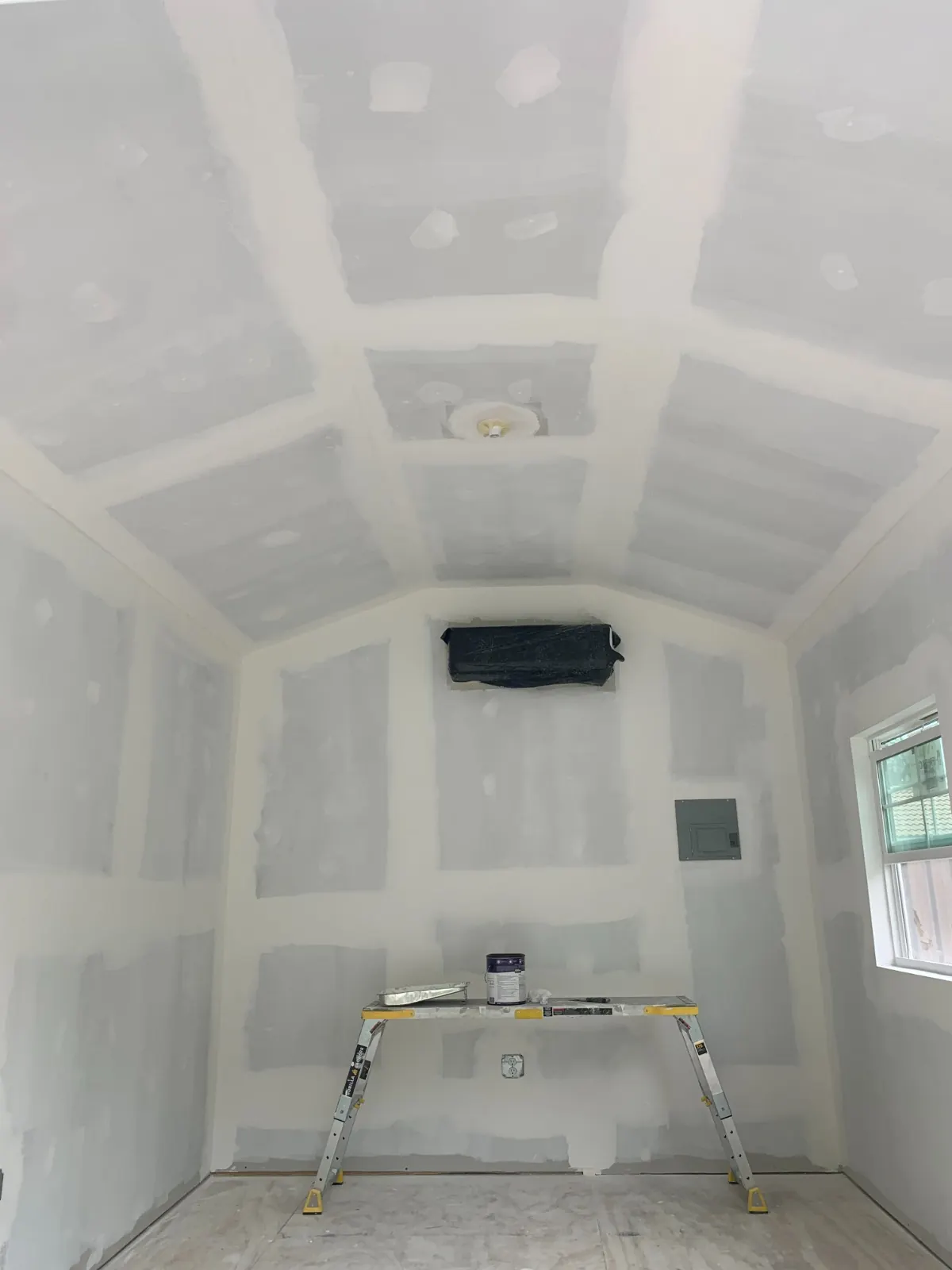 Vaulted drywall ceiling taped and finished, ready for paint