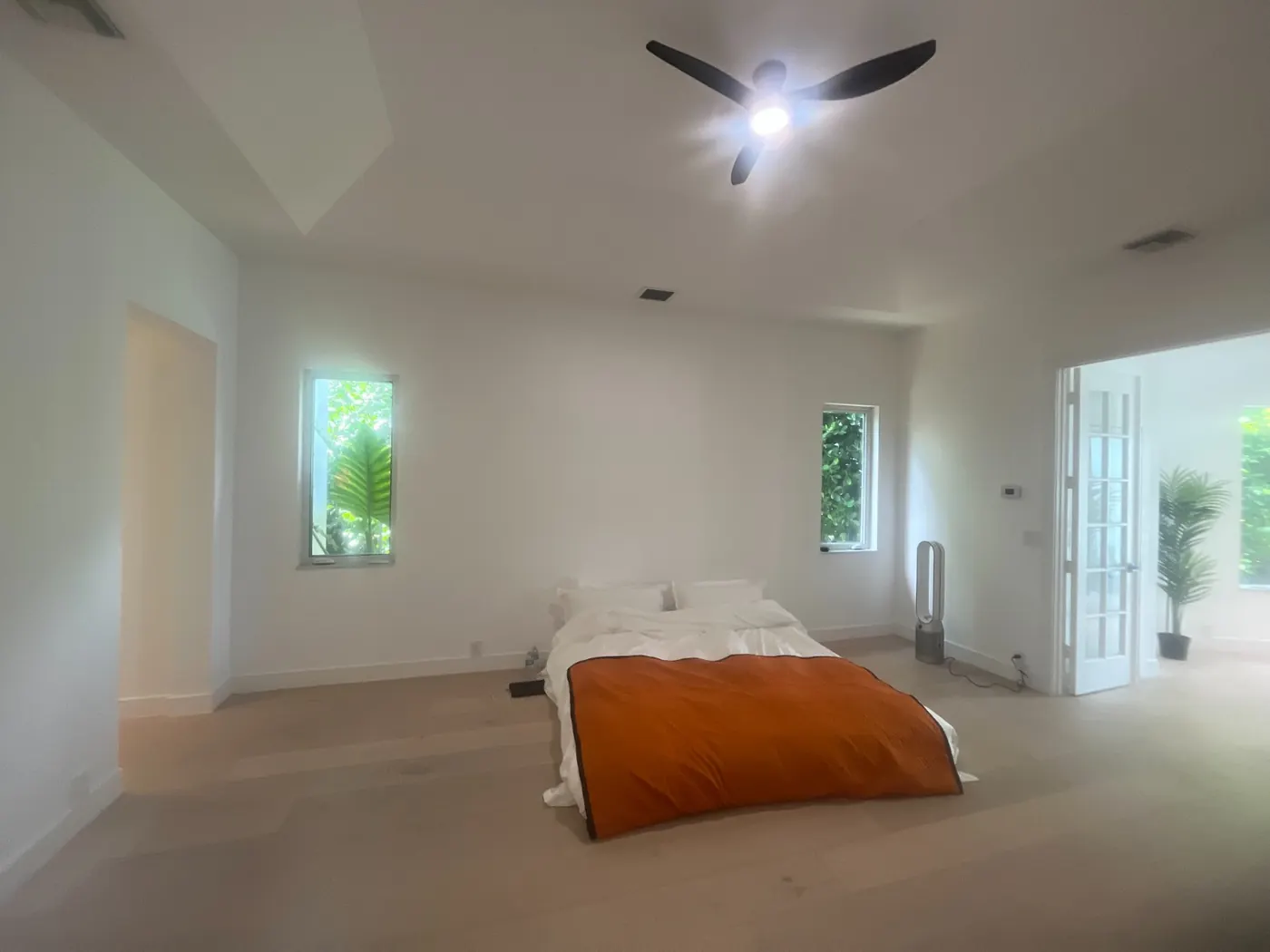 Bedroom with freshly painted white walls and ceiling in South Florida
