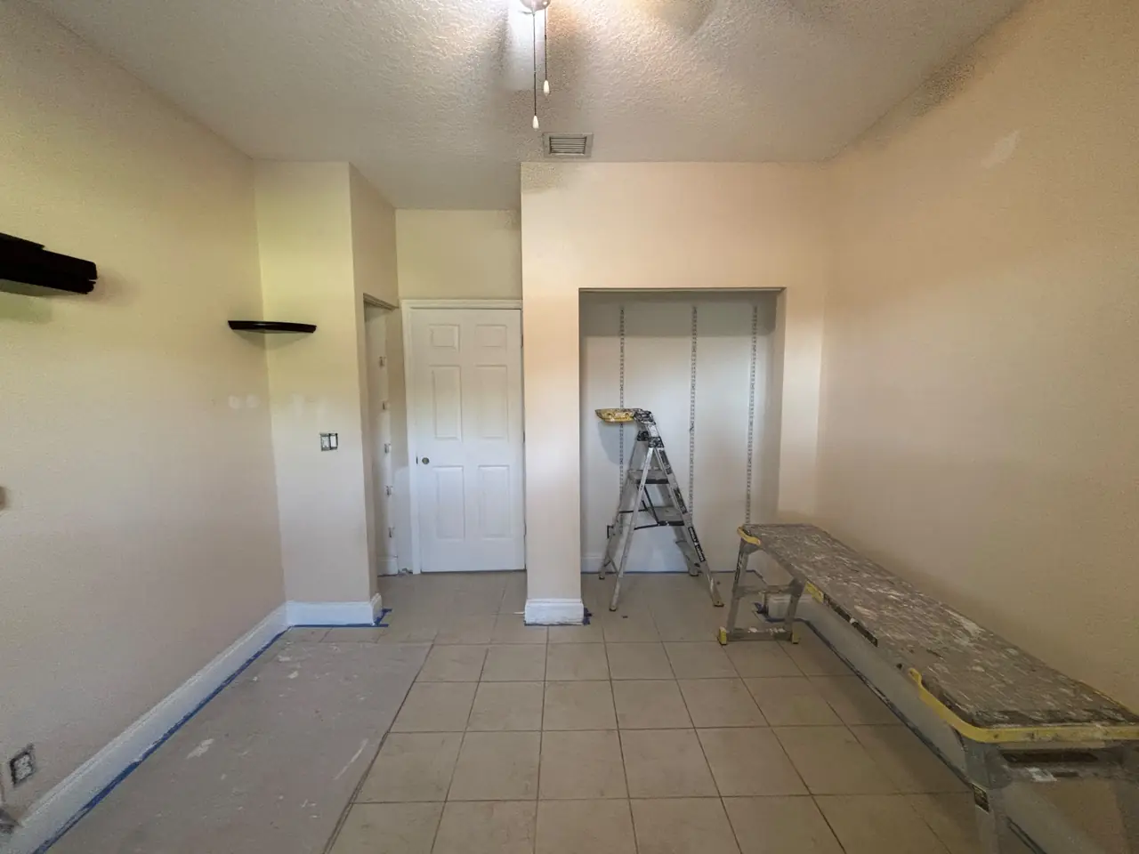 Closet and trim prepped and taped ahead of interior painting